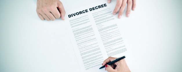 Man signing divorce decree